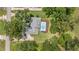 Aerial view showcasing the home's backyard, pool and the expansive lawn at 5326 Nw 76Th Ct, Ocala, FL 34482