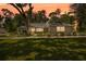 Charming one-story home boasts professional landscaping, newer paint, and updated shutters, enhancing its curb appeal at 5326 Nw 76Th Ct, Ocala, FL 34482