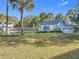 Inviting pool area surrounded by lush landscaping, offering a refreshing escape for residents to enjoy at 588 Fairways Ln # E204, Ocala, FL 34472