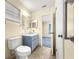 This is a bathroom featuring a bath tub, toilet and vanity at 6263 Sw 107Th St, Ocala, FL 34476