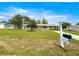 Charming single-story home with a well-manicured lawn, covered porch, and inviting curb appeal at 6263 Sw 107Th St, Ocala, FL 34476