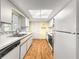 Well-lit kitchen with white appliances and ample counter space at 6263 Sw 107Th St, Ocala, FL 34476