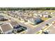 Spacious neighborhood showcasing diverse home styles, manicured lawns, and connected streets in an aerial shot at 6342 Sw 77Th Ave, Ocala, FL 34474