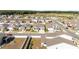 A beautiful aerial view of a residential neighborhood showcasing well-maintained homes and landscaping at 6342 Sw 77Th Ave, Ocala, FL 34474
