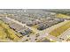 This aerial view presents a new housing development with modern homes at 6342 Sw 77Th Ave, Ocala, FL 34474