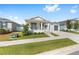 Attractive single-story home with a quaint front porch and a two-car garage at 6342 Sw 77Th Ave, Ocala, FL 34474