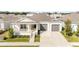 Charming single-story home with a two-car garage, covered porch, and well-manicured lawn at 6342 Sw 77Th Ave, Ocala, FL 34474