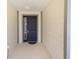 Elegant front door with sidelight, providing a welcoming entry to the home at 6342 Sw 77Th Ave, Ocala, FL 34474