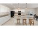 Modern kitchen featuring white cabinets, stainless steel appliances, granite countertops, and a center island at 6342 Sw 77Th Ave, Ocala, FL 34474