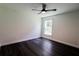 Bright bedroom featuring a ceiling fan and hardwood floors at 6600 Sw 109Th Ln, Ocala, FL 34476