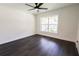 Well lit bedroom showing hardwood floors and natural light at 6600 Sw 109Th Ln, Ocala, FL 34476