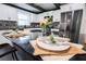 Close up of kitchen island with bar seating, adjacent to modern appliances and plenty of counter space at 6600 Sw 109Th Ln, Ocala, FL 34476