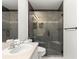 Modern bathroom featuring a glass-enclosed shower with gray tiling and a built-in seat at 6758 Sw 114Th Street Rd, Ocala, FL 34476