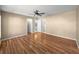 Large bedroom with wood floors and neutral paint tone at 6758 Sw 114Th Street Rd, Ocala, FL 34476