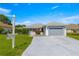Charming single Gathering home featuring a spacious driveway and well-manicured front yard at 6758 Sw 114Th Street Rd, Ocala, FL 34476