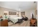 Relaxing bedroom with natural light, hardwood floors, and ample storage space at 6858 Sw 111Th Loop, Ocala, FL 34476