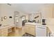 Bright kitchen features tile flooring, modern appliances, and a breakfast nook with sliding glass doors at 6858 Sw 111Th Loop, Ocala, FL 34476