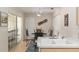 Kitchen features tile flooring, stainless steel faucet and an eat-in kitchen with outdoor access at 6858 Sw 111Th Loop, Ocala, FL 34476