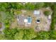 High angle bird's eye view of the home featuring a screened in pool at 8130 Sw 209Th Court Rd, Dunnellon, FL 34431