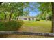 Charming single-story home with well-maintained front yard and mature trees at 8130 Sw 209Th Court Rd, Dunnellon, FL 34431