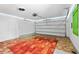 Spacious two car garage with overhead lighting and lots of room for storage at 8130 Sw 209Th Court Rd, Dunnellon, FL 34431