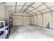 Spacious metal garage with shelving offering lots of storage space at 8130 Sw 209Th Court Rd, Dunnellon, FL 34431