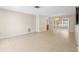 Bright living room featuring tile flooring and sliding glass doors to the lanai at 8130 Sw 209Th Court Rd, Dunnellon, FL 34431
