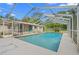 Relax in this screened-in pool, perfect for cooling off and enjoying the Florida sunshine at 8130 Sw 209Th Court Rd, Dunnellon, FL 34431