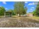 Spacious rural property featuring outbuildings, sheds, and mature trees at 8130 Sw 209Th Court Rd, Dunnellon, FL 34431