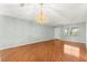 Open living space with hardwood floors, a ceiling fan, and plenty of natural light at 8569 Sw 92Nd Ln # D, Ocala, FL 34481