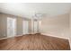 Spacious bedroom features wood-look flooring, two closets and a bathroom at 8569 Sw 92Nd Ln # D, Ocala, FL 34481