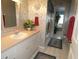 Bathroom showcasing a sink with a shell-themed wallpaper at 8765 Sw 190Th Cir, Dunnellon, FL 34432
