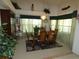 Dining room with elegant furnishings and a view of the backyard at 8765 Sw 190Th Cir, Dunnellon, FL 34432
