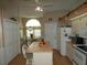 Bright eat-in kitchen with appliances, tile floors, and lots of storage at 8765 Sw 190Th Cir, Dunnellon, FL 34432