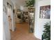 Inviting living room with a fireplace, tile floors, and lots of natural light at 8765 Sw 190Th Cir, Dunnellon, FL 34432