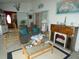 Sitting room with decor, lighting, and chairs at 8765 Sw 190Th Cir, Dunnellon, FL 34432