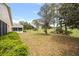 Grassy backyard featuring a golf course view at 9093 Sw 91St Cir, Ocala, FL 34481