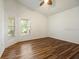 Bright bedroom with hardwood floors and large windows at 9093 Sw 91St Cir, Ocala, FL 34481