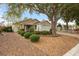 Single-story home with mature trees and shrubs at 9093 Sw 91St Cir, Ocala, FL 34481