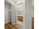 Hallway with view to closet and bathroom at 9093 Sw 91St Cir, Ocala, FL 34481
