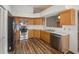 Kitchen with stainless steel appliances and hardwood floors at 9093 Sw 91St Cir, Ocala, FL 34481