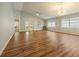 Open living space featuring vaulted ceilings and hardwood floors at 9093 Sw 91St Cir, Ocala, FL 34481
