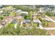 A nice residential area featuring charming homes and peaceful streets surrounded by lush greenery at 9859 Sw 45Th Ave, Ocala, FL 34476