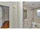 Bright bathroom with tub and shower combo, vanity, and neutral color scheme at 9859 Sw 45Th Ave, Ocala, FL 34476