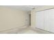 Bedroom with ceiling fan, closet, and neutral color scheme at 9859 Sw 45Th Ave, Ocala, FL 34476