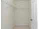 A walk-in closet with wire shelving, providing organized storage space at 9859 Sw 45Th Ave, Ocala, FL 34476
