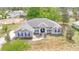 Charming single-Gathering home with a well-manicured lawn and attractive blue shutters at 9859 Sw 45Th Ave, Ocala, FL 34476