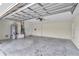 Clean two-car garage with water heater, laundry hookups, and plenty of open space at 9859 Sw 45Th Ave, Ocala, FL 34476