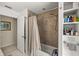 Bathroom featuring a tub, shower, and built-in shelving at 4966 Sw 107Th Loop, Ocala, FL 34476