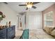Bedroom with closet space and view of backyard and access to additional rooms at 4966 Sw 107Th Loop, Ocala, FL 34476